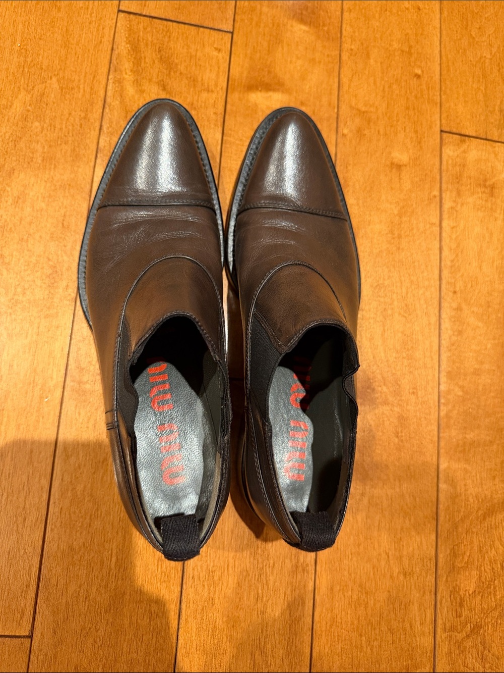 Miu Miu woman’s Dark Brown Leather Slip-On Loafers